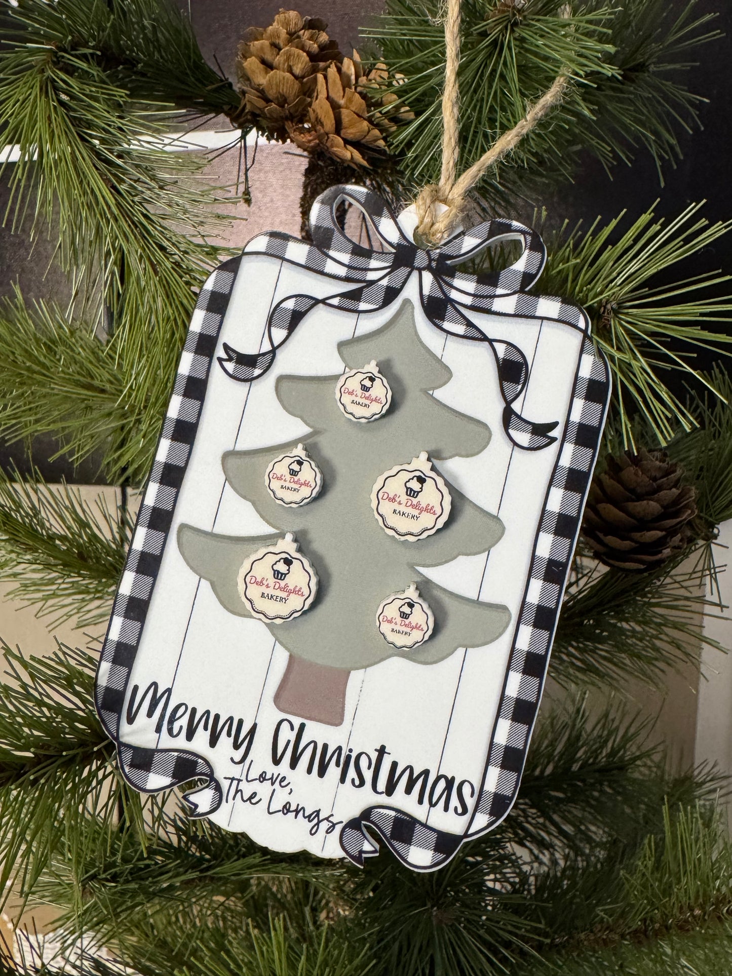 Decorative Ornament with 3D ornaments attached. This one was created for a local Bakery