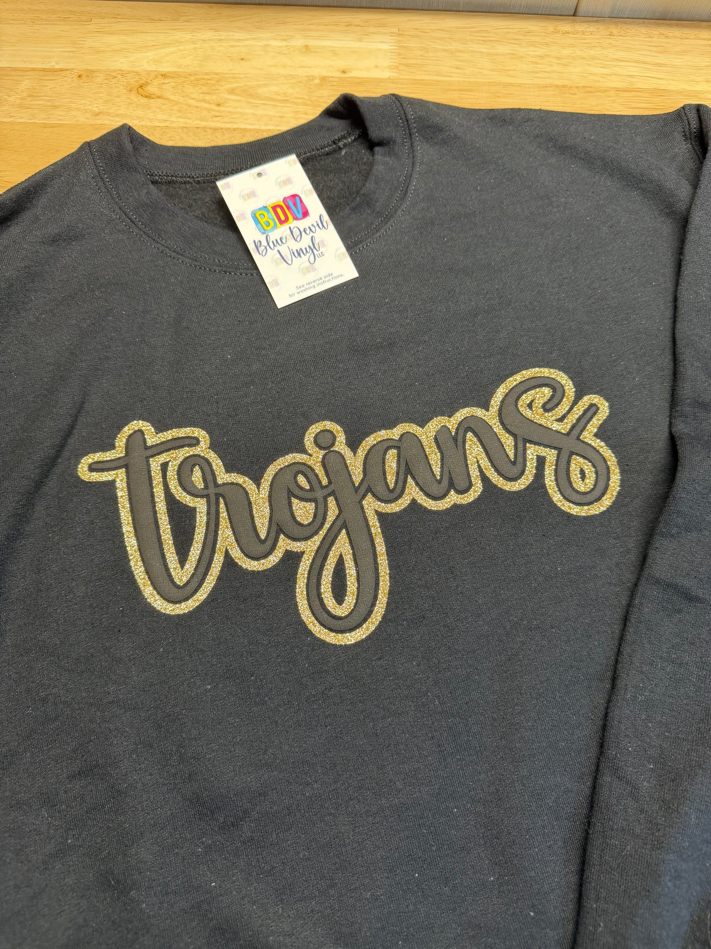 Gildan Black Crewneck Sweatshirt - Trojans Puff design with Gold Glitter - Adult Medium