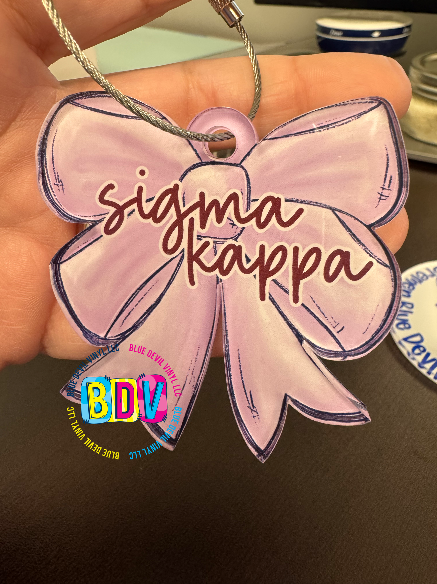 Lavender Bow bag tag with Maroon Fancy font outlined in white