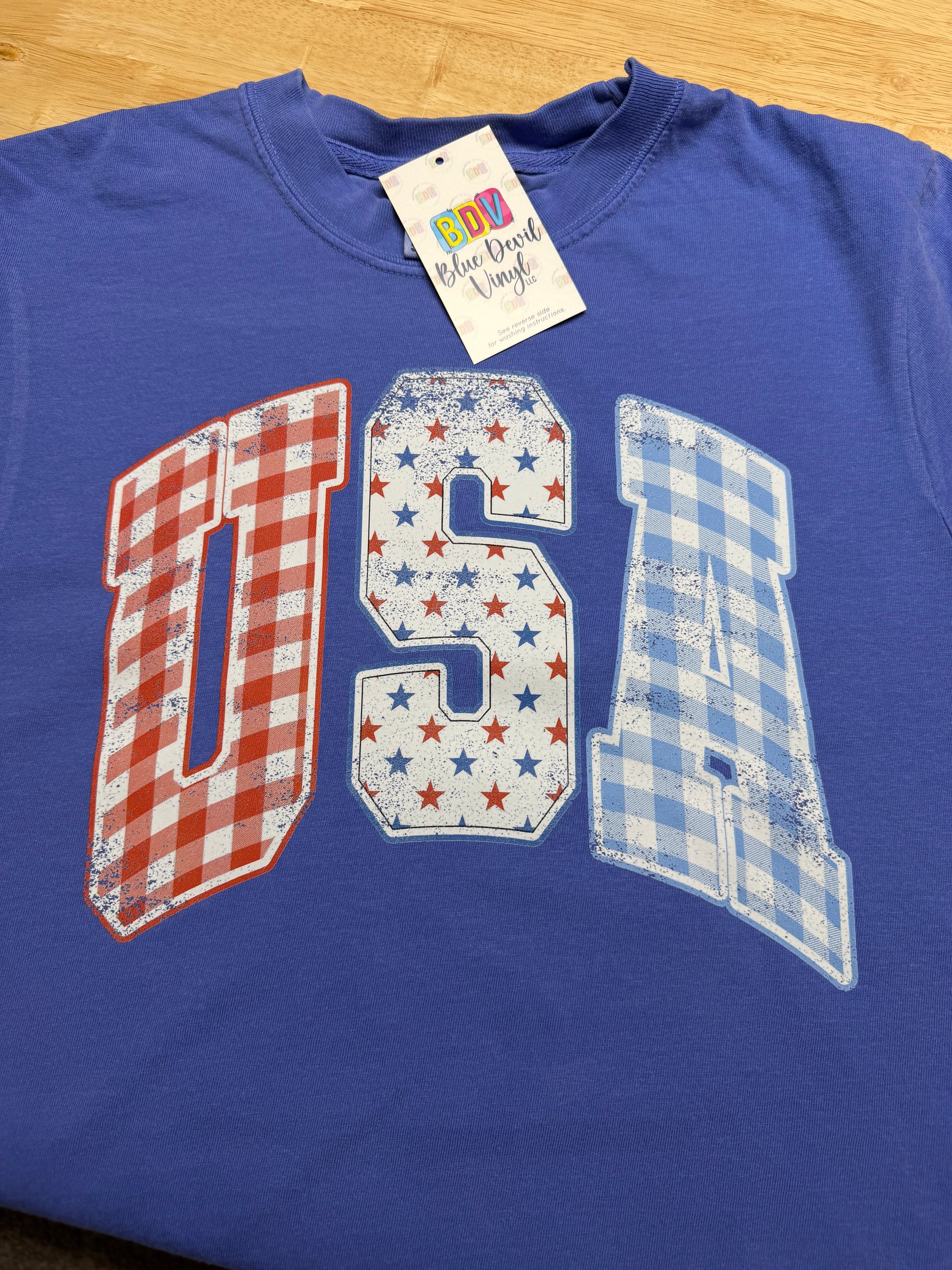 Bright Blue t-shirt with 'USA' design featuring Stars and Stripes