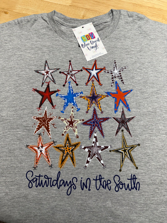 Gray t-shirt with colorful star designs and wording 