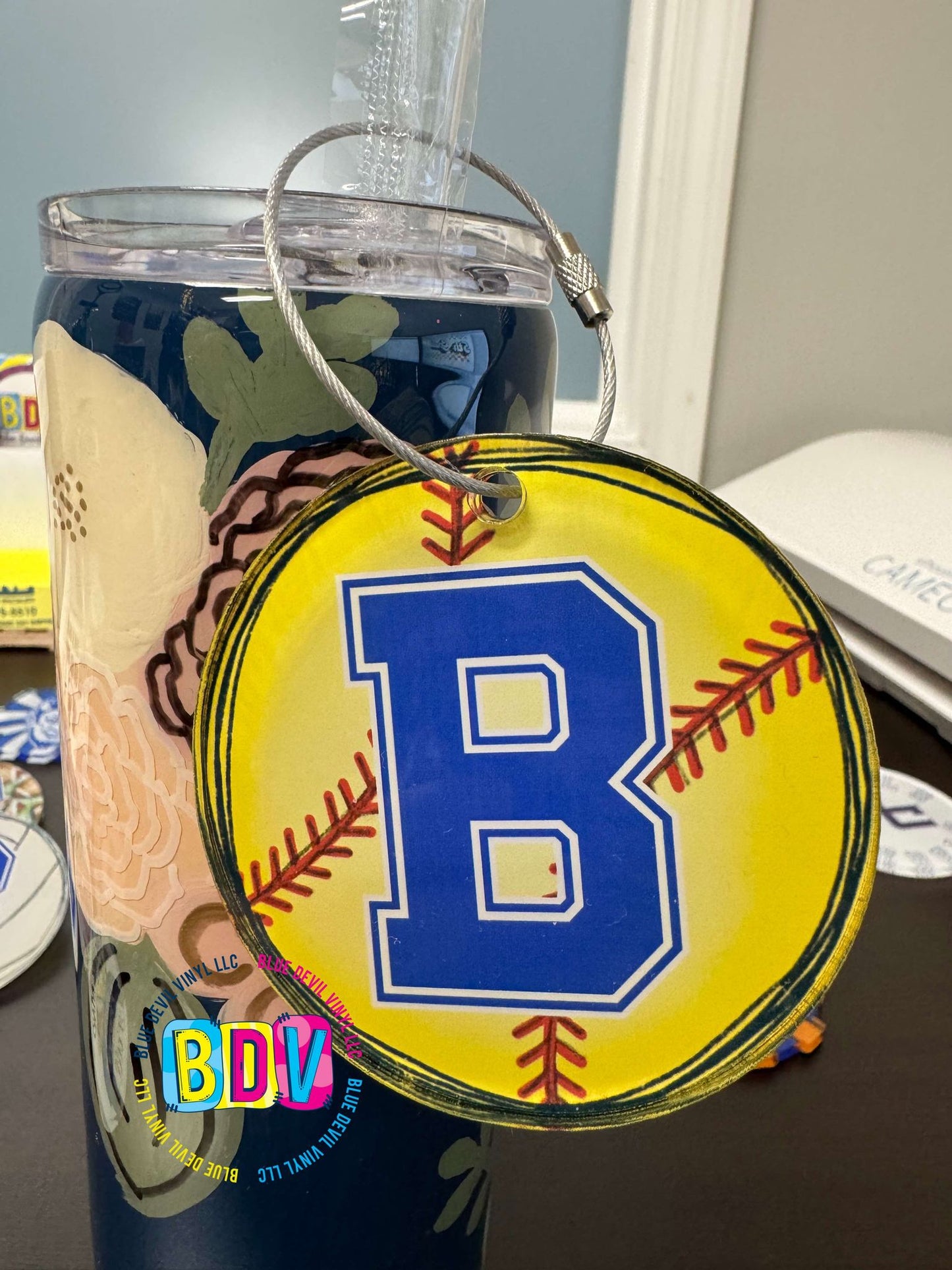 Softball with Bremen B logo on 3-inch Acrylic Bag Tag with metal ring 